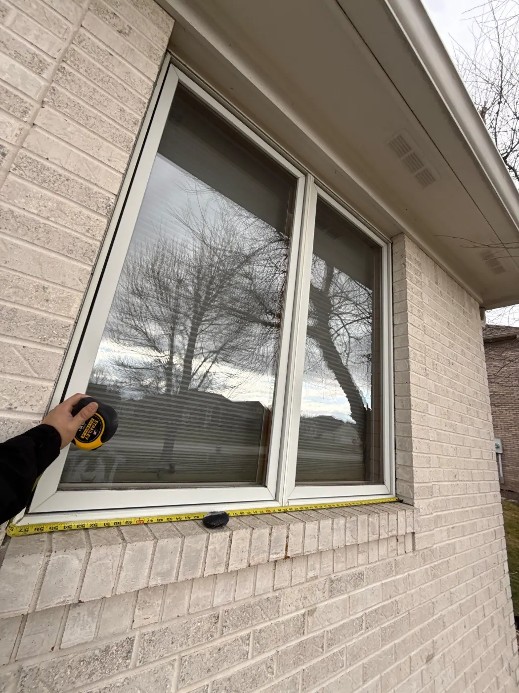 Window replacement documented in Clarks Hill